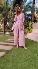 Bell-Bottoms Paired with a Sleek Halter Vest and Blazer