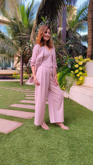 Bell-Bottoms Paired with a Sleek Halter Vest and Blazer