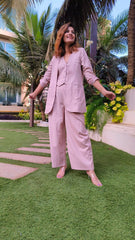 Bell-Bottoms Paired with a Sleek Halter Vest and Blazer